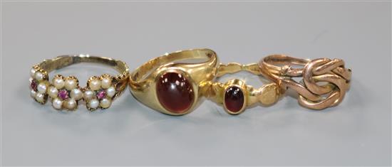 Three early 20th century gem set rings including one 18ct gold and a later 9ct gold gem set ring.
